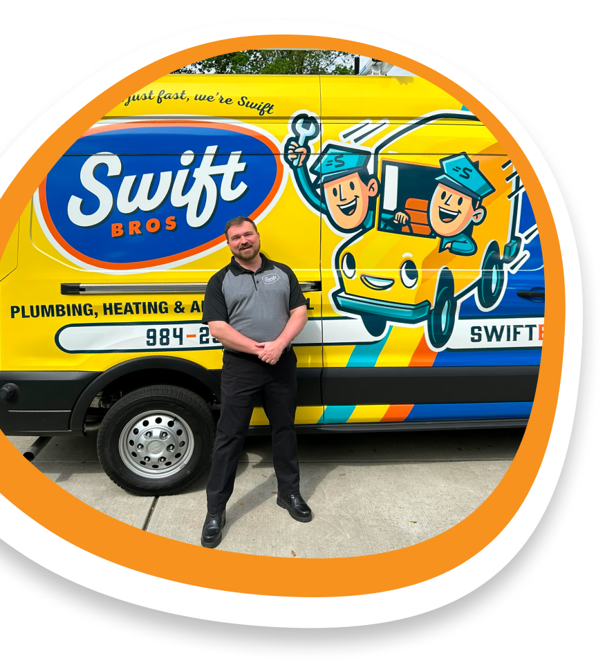 Man standing beside a colorful Swift Bros Plumbing service van.