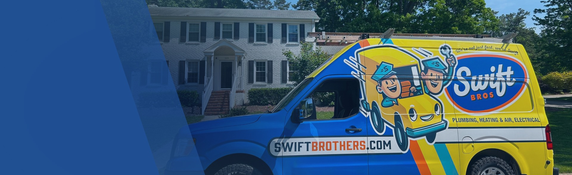 Colorful yellow-and-blue food truck parked on a city street.